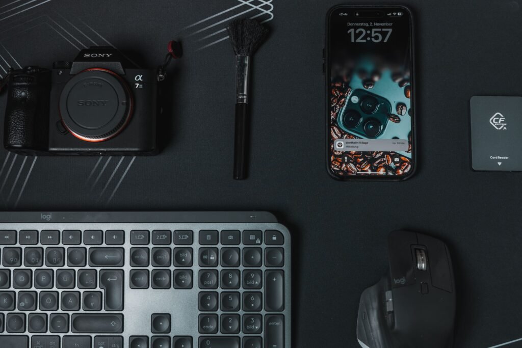 laptop and smartphone on a clean desk for digital decluttering
