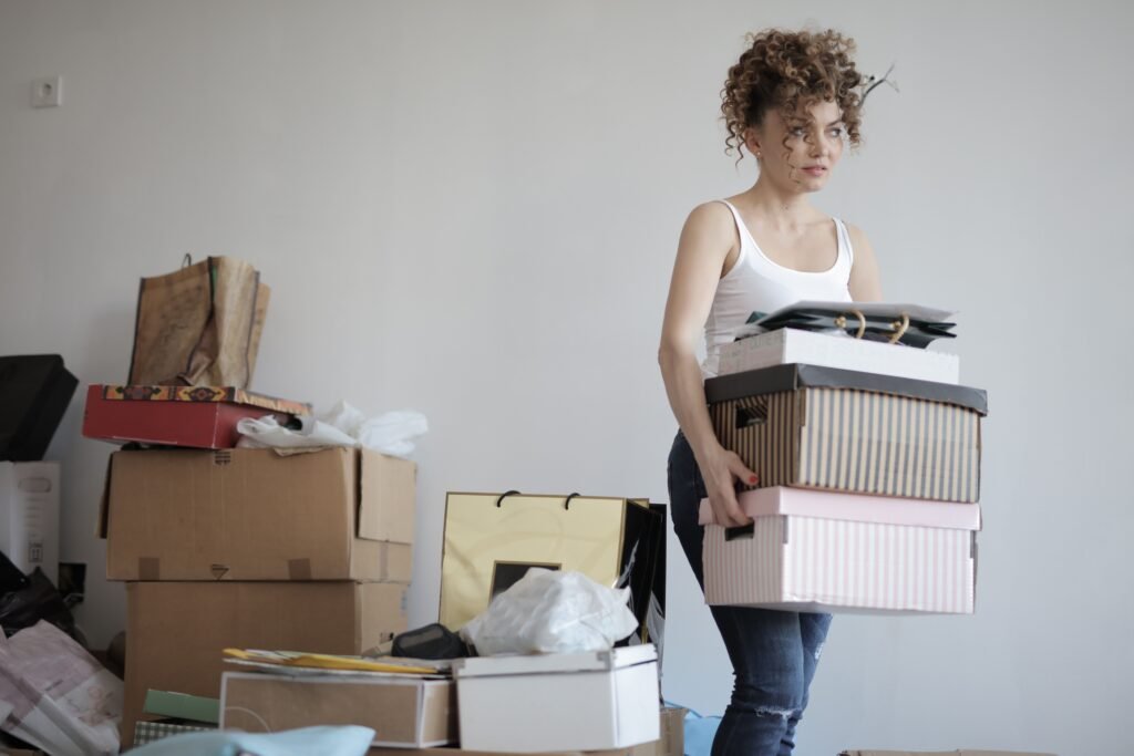 Woman deciding what to keep, throw away and stop buying