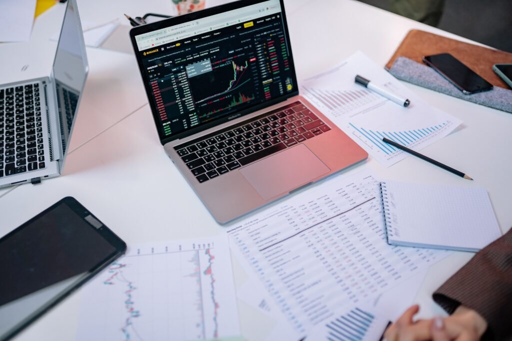 organized digital workspace with laptop and documents